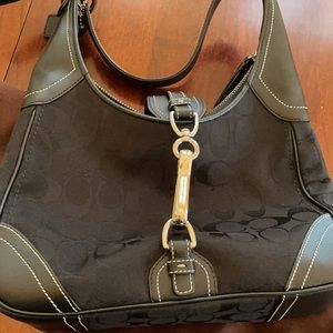 Black Coach Handbag. Like New! Comes with dust bag. No scratches, or wear
